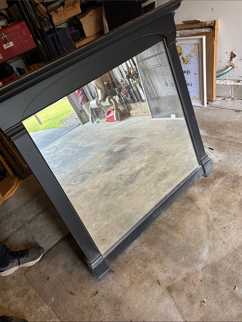 Pottery Barn Black Framed Mirror - 
44" x 41".  Nice mounted for your bar .